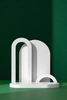 Modern White Architectural Shapes Against A Deep Green Background Displayed On A Simple Table Setting photo