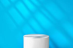 A minimalistic podium illuminated by a beam of light against a blue backdrop in a studio setting photo