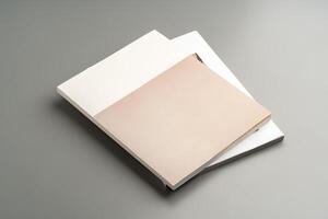A minimalistic design showcasing an open book resting on a gray surface in soft lighting photo