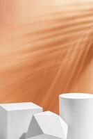 White geometric shapes arranged stylishly on a soft peach background in a minimalist setting photo