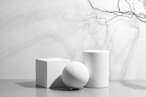 Abstract composition featuring three white geometric shapes in a minimalist interior setting photo