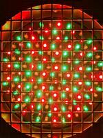 Close up view of a colorful spotlight with the LEDs and small RGB designations. photo