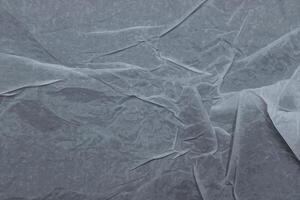 A close up of a piece of paper with crumpled edges photo