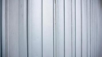 close up of white corrugated metal sheet texture or background. photo
