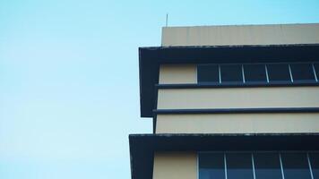 Modern office building with blue sky in the background. Business concept. photo