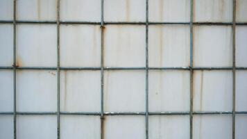 abstract background texture of old rusty metal wall with a lattice photo