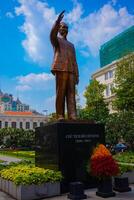 A statue of Ho Chi Minh at Guyen hue street in Ho Chi Minh City photo