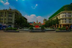 A fountain at the downtown at Nguyen Hue street in Ho Chi Minh wide shot photo