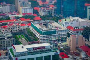 A high angle view of miniature cityscape at the downtown in Ho Chi Minh daytime tiltshift photo