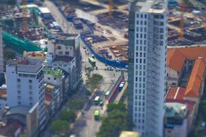 A miniature traffic jam at the busy town in Ho Chi Minh high angle tiltshift photo