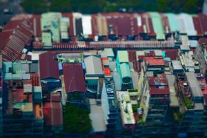 A high angle view of miniature cityscape at the downtown in Ho Chi Minh daytime tiltshift photo