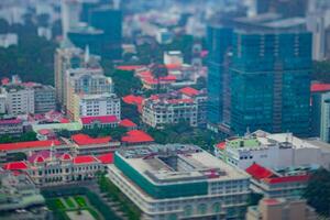 A high angle view of miniature cityscape at the downtown in Ho Chi Minh daytime tiltshift photo