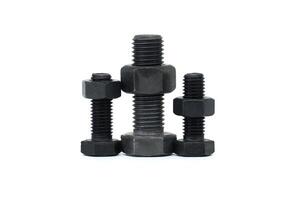 Assorted metal bolts and nuts isolated on white background photo
