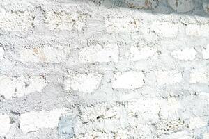 stacks of concrete bricks or blocks arranged on the ground photo