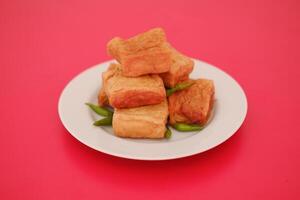 Tahu Bakso, Indonesian traditional snack made from tofu and beef. Served in white plate. photo