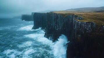 Dramatic Coastal Landscape with Rugged Cliffs and Crashing Waves photo