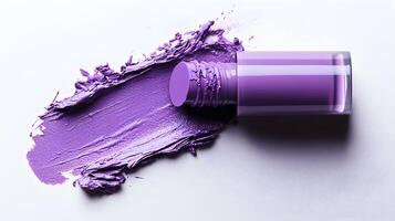 Vibrant Lavender Lipstick with Open Cap and Visible Texture on White Background photo