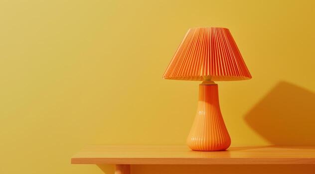 Table lamp with yellow lampshade stands on wooden table. Copyspace. Yellow back photo