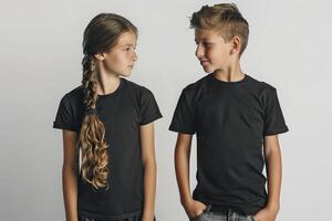 Children in black t-shirts on a white background. photo
