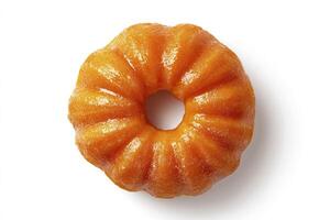 Donut in the shape of a pumpkin on a white background. photo