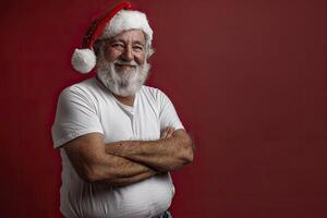 Santa Claus wearing a white shirt on a red background. photo