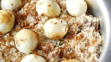 Rice with eggs and onions in a pan video