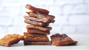 A stack of pieces of caramel on a table video