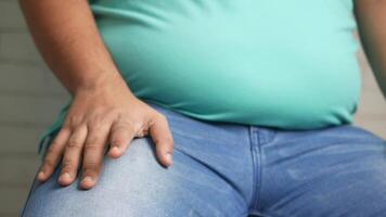 A man with his hands on his stomach video