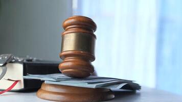 Judge gavel on a desk with a stack of papers video