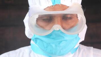 A man wearing a protective mask and goggles video