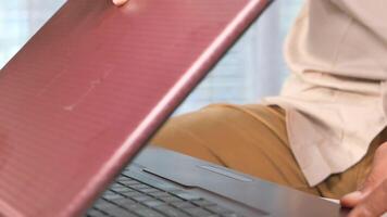 A person is using a laptop computer video