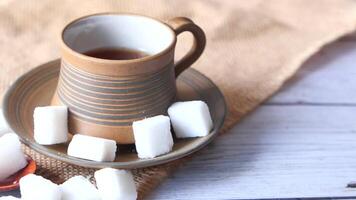 How to make a cup of tea with sugar cubes video