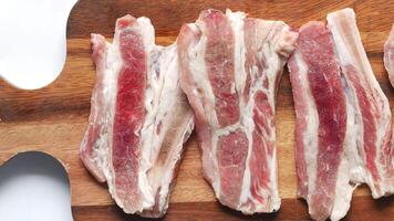Bacon strips on a cutting board video