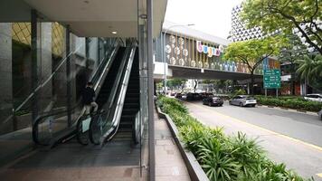 An escalator is seen in front of a building video