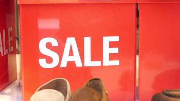 Exciting Sale Announcement Featuring a Display of Various Styles of Shoes Available video