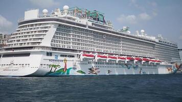 turkey istanbul 13 june 2024, A magnificent luxury cruise ship is docked at the bustling port under a clear blue sky video