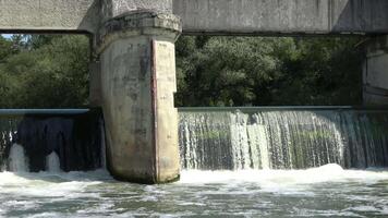 The water weir in Werne in the sunshine to generate electricity on the River Lippe. video