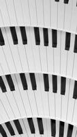 Concept of music, endless rotating wheel with piano keys. Design. Spinning bending rows of piano keys. video