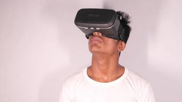 A man wearing a virtual reality headset video