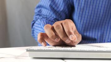A man's hand on a keyboard video