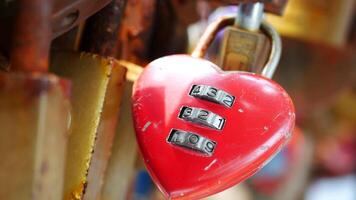A red heart shaped lock with a lock and a padlock video