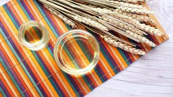 Wheat and oil on a striped tablecloth video