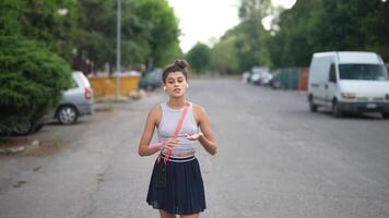 The vibrant youth in an urban setting show character and style while exploring their surroundings video