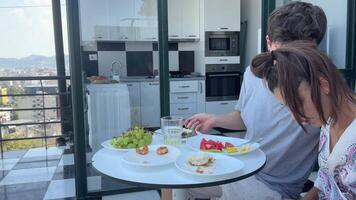 Enjoying a delightful breakfast on the balcony while surrounded by beautiful scenic views video