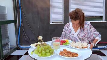 Savoring a Fresh and Delicious Meal While Relaxing on a Comfortable Balcony Space video