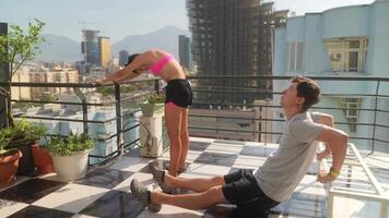 Experience Dynamic Fitness Training up on a Rooftop, complemented by a Scenic City View video
