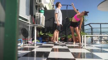 Enjoying Fitness Training on a Sunny and Inviting Balcony While Embracing Nature and Community video