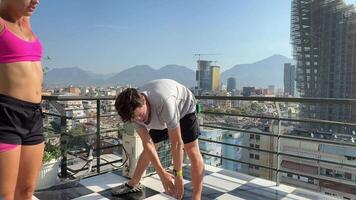 Engaging in an Outdoor Fitness Routine while enjoying the Scenic City Views nearby video
