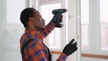 Worker installing and checking window in the house video