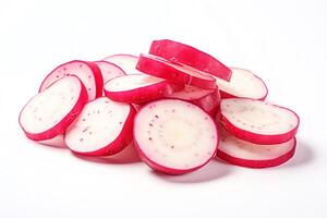 A close-up image of a pile of thinly sliced radishes on a white background photo